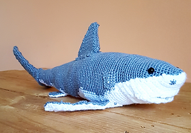 This is a grey and white crocheted, Grey Nurse Shark.