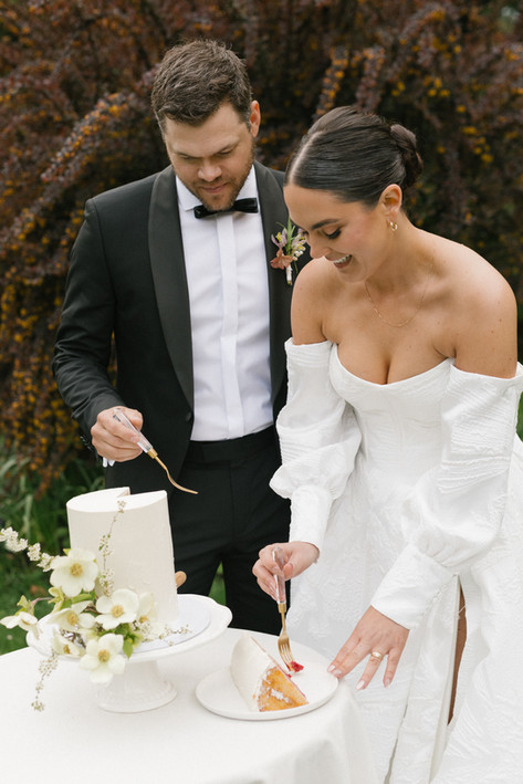 Textured white buttercream wedding cake with floral statement at Deer Leap Farm