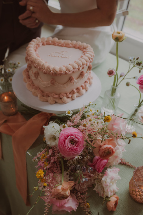 Vintage pink heart-shaped wedding cake at Sea Cider Farm & Ciderhouse
