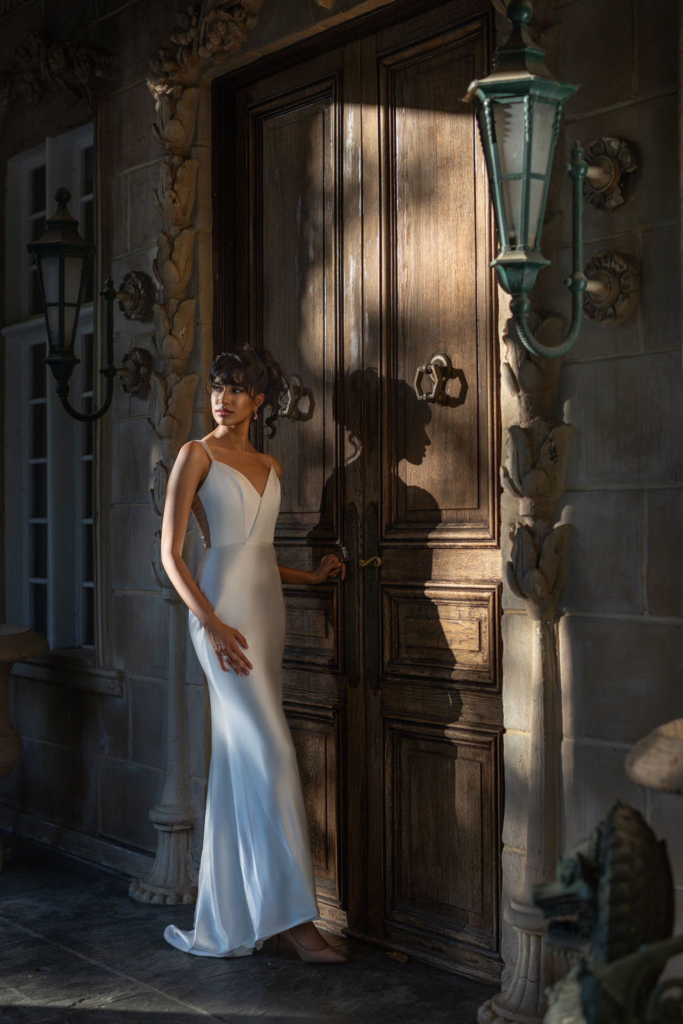 A secure, textured updo designed to withstand outdoor conditions while maintaining softness and elegance throughout the day.