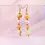 Miniatura: Pendientes de cerámica para mujer, amarillo sol y blanco satinado.