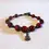Thumbnail: Fine bracelet, ceramic beads and cello charm, amber and black color