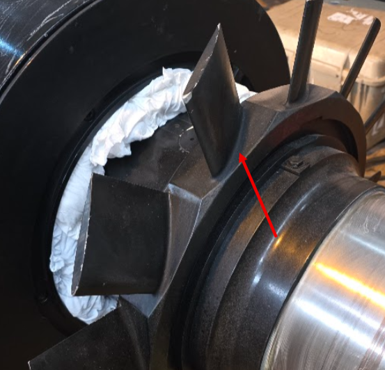Generator fan hub and coated fan blades examined with eddy current testing