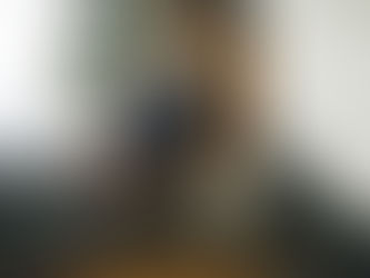 pregnant woman by christmas tree