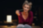 woman sitting in the library thinking