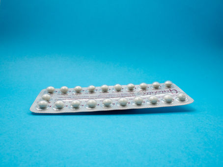 birth control on blue background