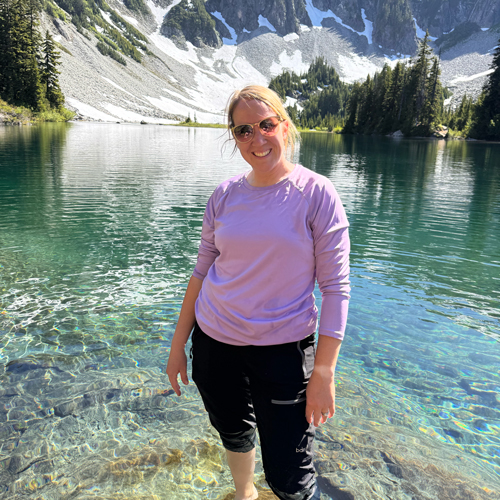 picture of lady standing in water at Snow Lake in Washington