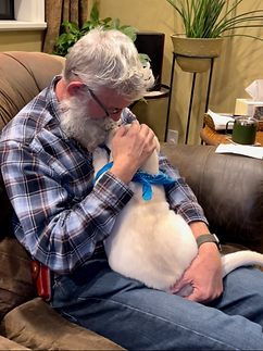 Ozzy & Dad hugging his pup!.png