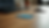 Eye-level view of a credit card resting on a wooden table