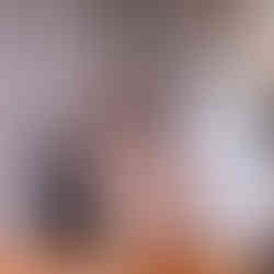 Charlotte Mok during the hands-on instrument exploration segment after the concert, demonstrating how to play the cello.