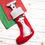 Thumbnail: Bas de Noël en polar rouge avec un lévrier italien cousu sur le dessus