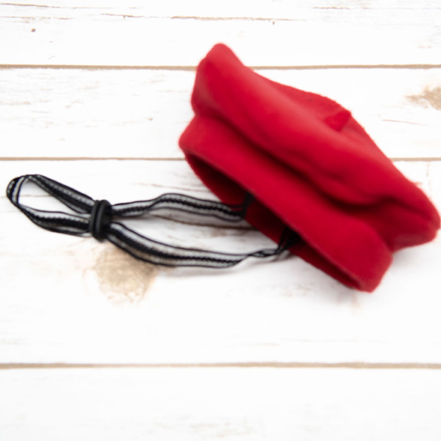 Red hanmade fleece beret for dog — side view