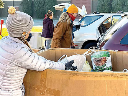 Thanksgiving Food Box program helps families from all corners of Ada County