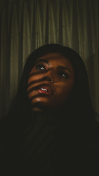 A portrait that uses a light source that is unnatural or not easily identified. 