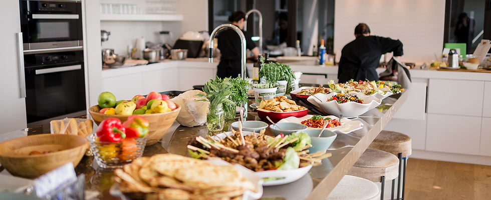 A personal and private chef preparing a small catering event in a private home