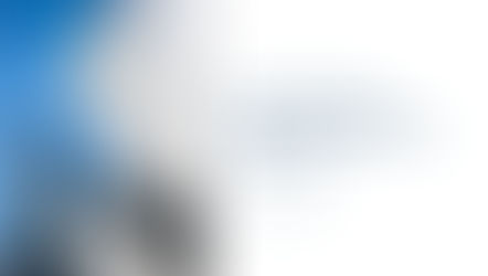 A lone figure stands on sweeping architectural steps between towering glass skyscrapers against a bright blue sky, alongside the title 'The Reality Gap: Why Your Team Dreads the New System' published by Dimensional Community in The SimCorp Review