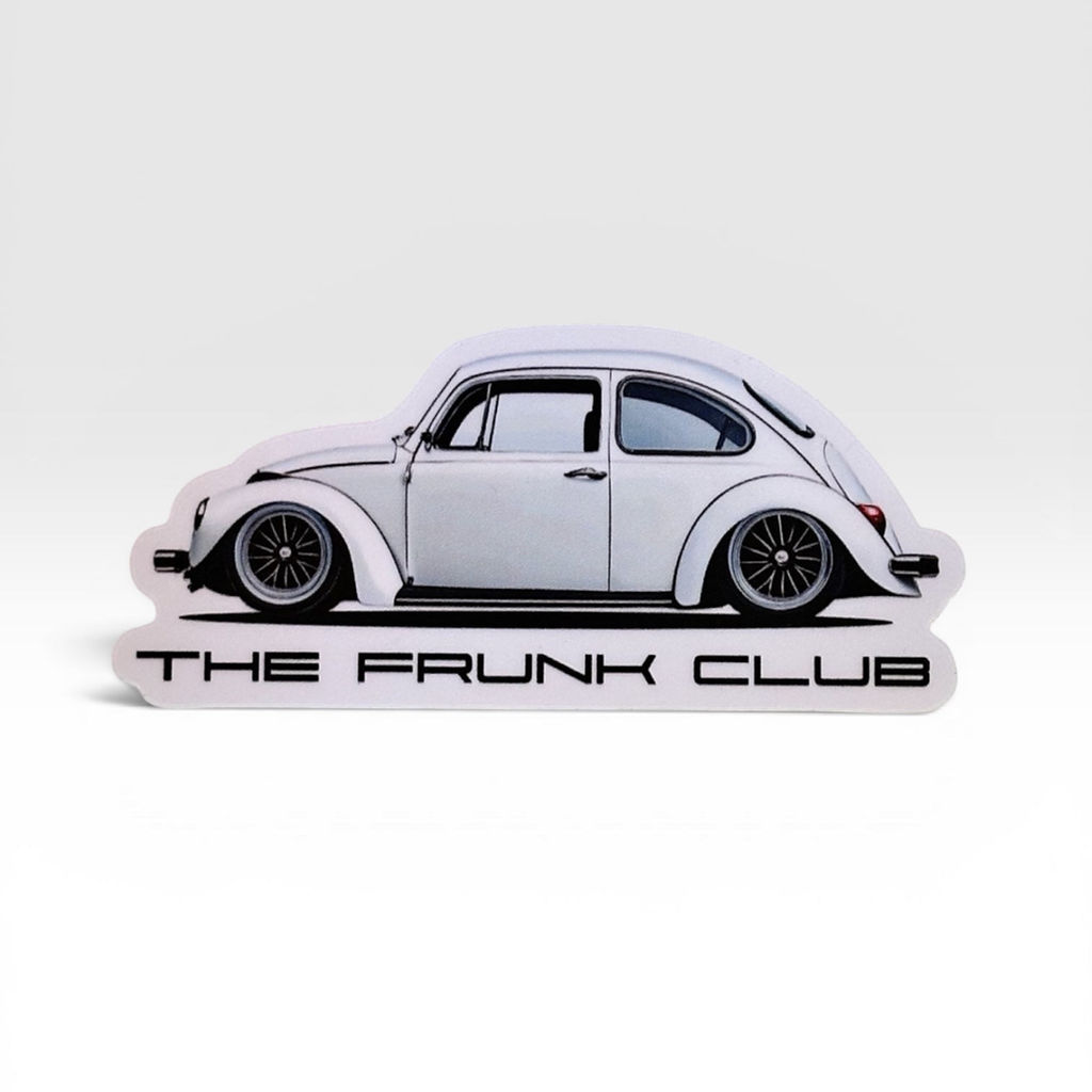 Side‑profile illustration of a white Super Beetle with lowered stance and “THE FRUNK CLUB” text below.