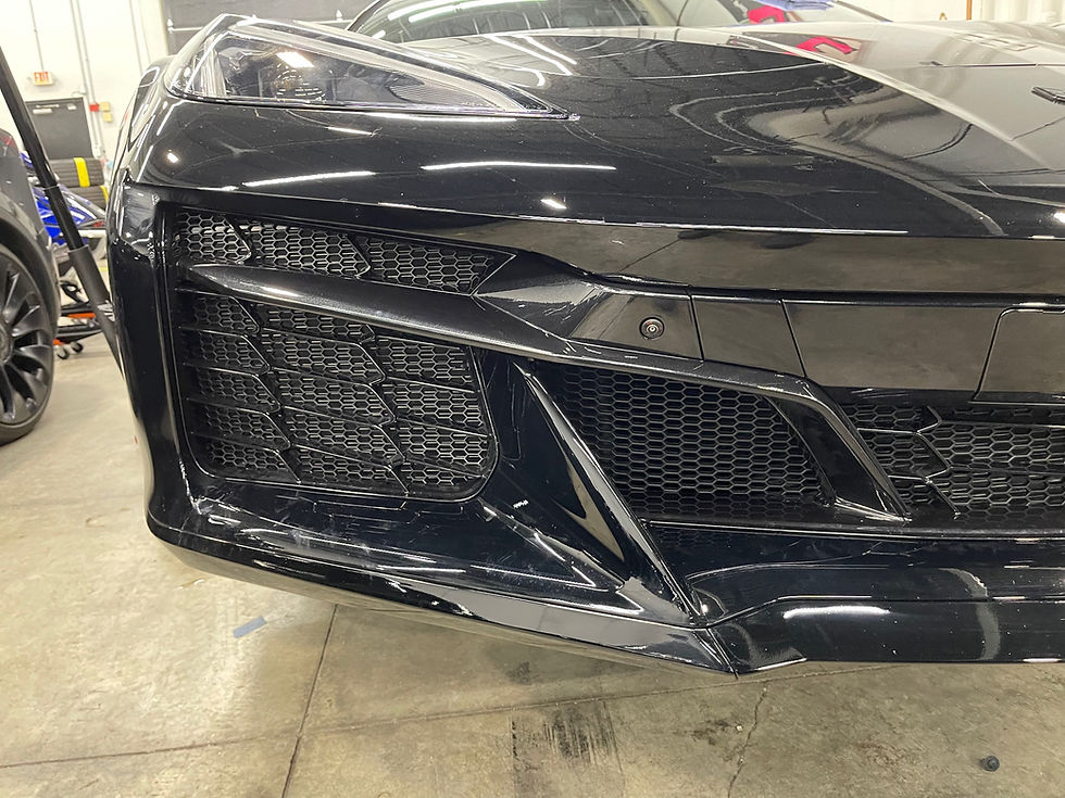 Thumbnail: Close-up of hexagon mesh grille screen on C8 Z06 front bumper