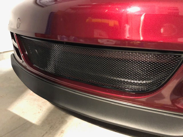 Thumbnail: Protective mesh grille on Porsche 911 997.1 stopping rocker and debris, installed seamlessly