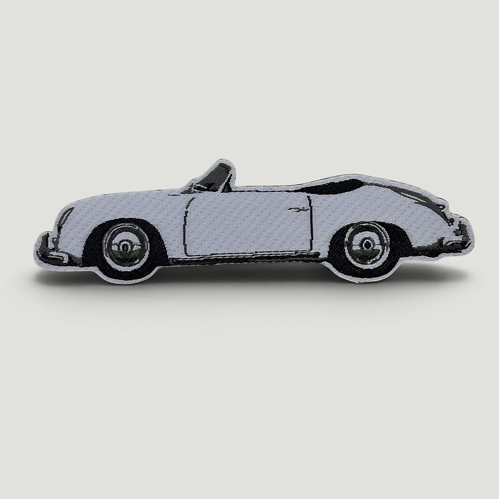 Thumbnail: Side‑profile photo of a white sports car against a neutral background.