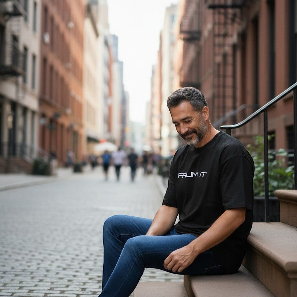 Man wearing a Frunk It short sleeve t-shirt with additional black, red, and gray shirt color options shown.