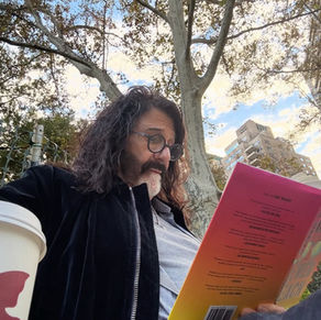 Pierre Robert posted this photo on social media over this weekend, reading a book and enjoying a cup of coffee in Rittenhouse Square (Facebook)