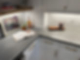 smooth dark gray counter in modern kitchen with jigsaw fit seam