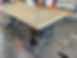 Concrete coffee table on fabricated steel legs