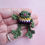 Thumbnail: Crochet Pride Flag Frog Brooch