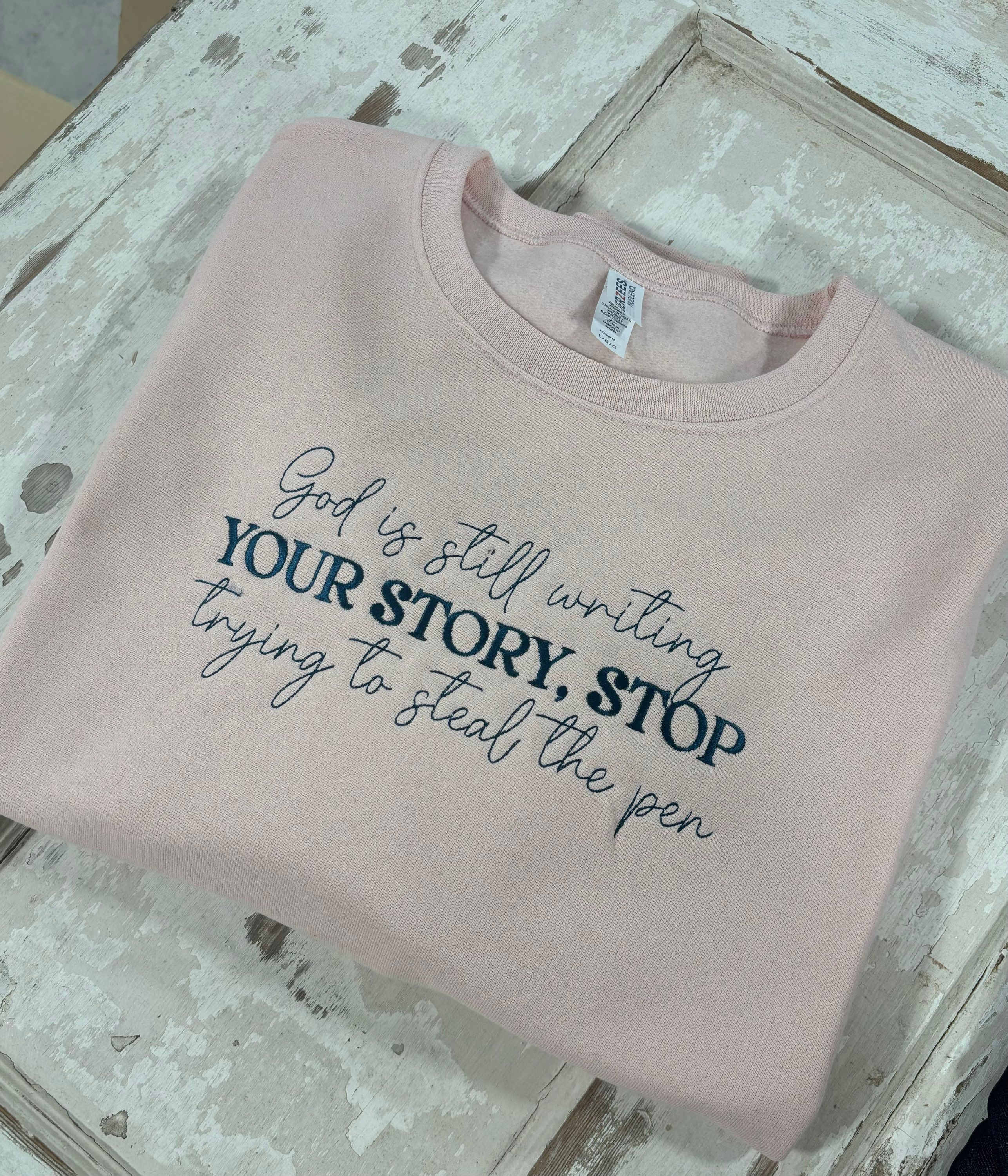 God is still writing sweatshirt 