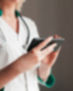 Doctor holding a smartphone