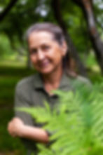 60yearold-woman-green-dress-outdoors-summer