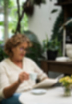 caucasian-woman-relaxing-while-reading-book.jpg