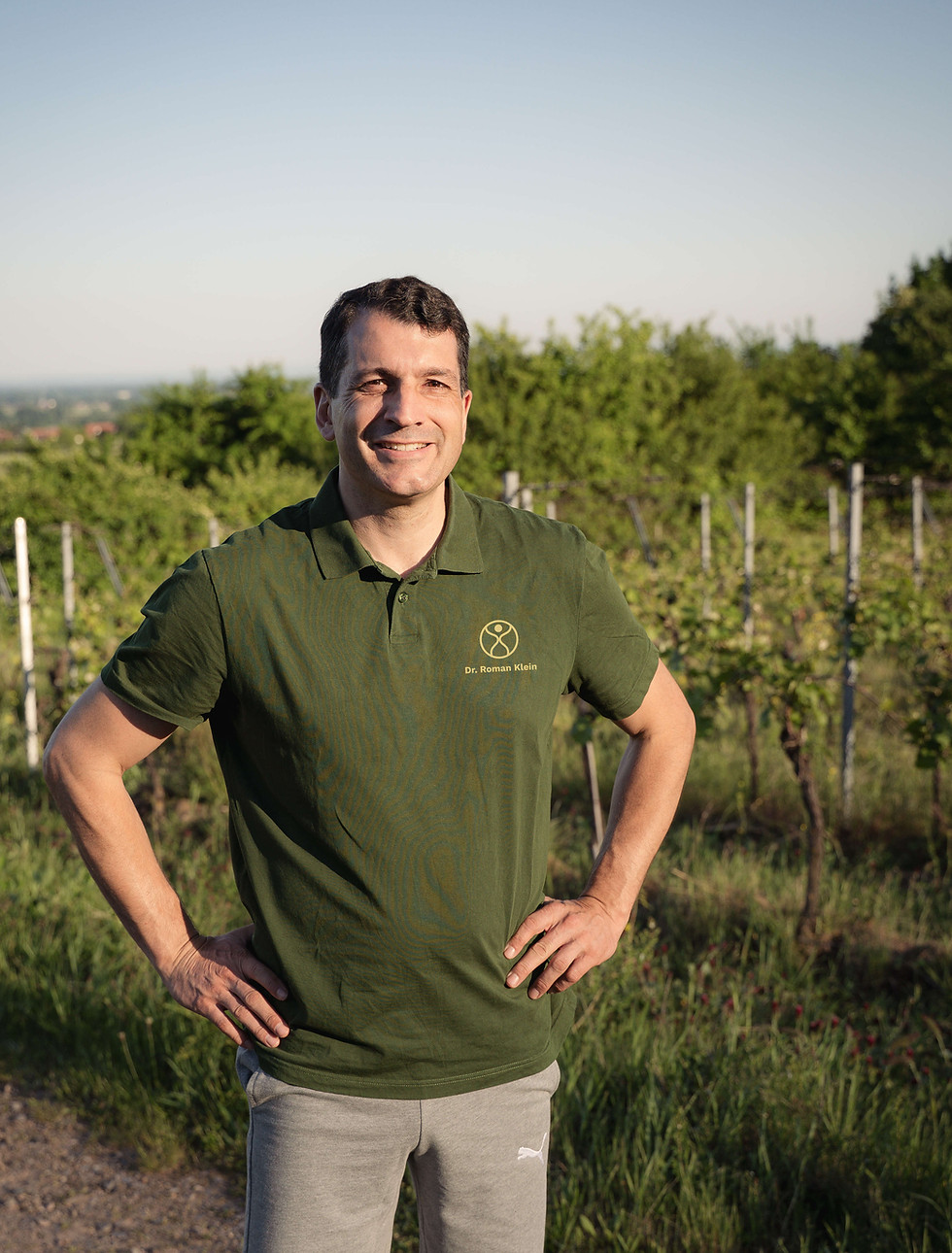 Lächelnder Dr. Roman Klein am Pfalz