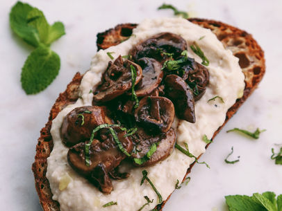White bean pure and sautéed mushrooms on toast