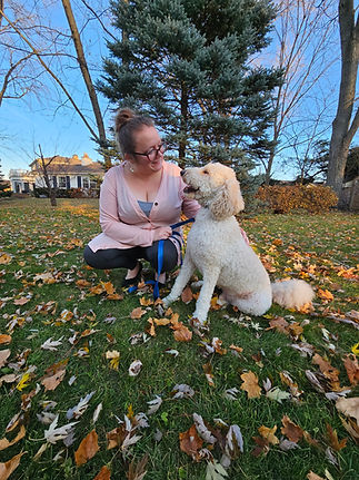 Photo of a the creator of this website with her dog