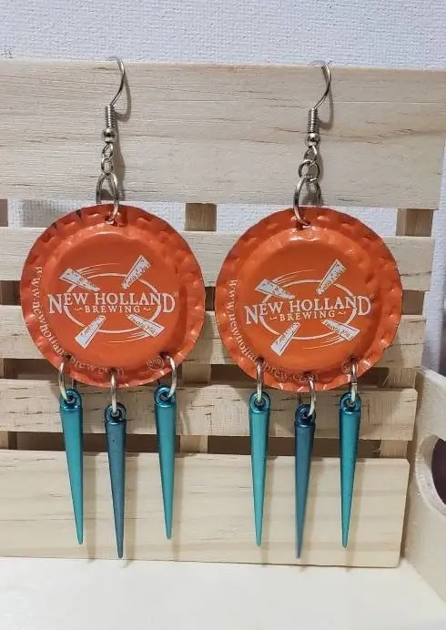 orange beer cap earrings with blue spikes