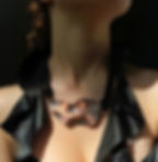 girl wearing copper leaf necklace