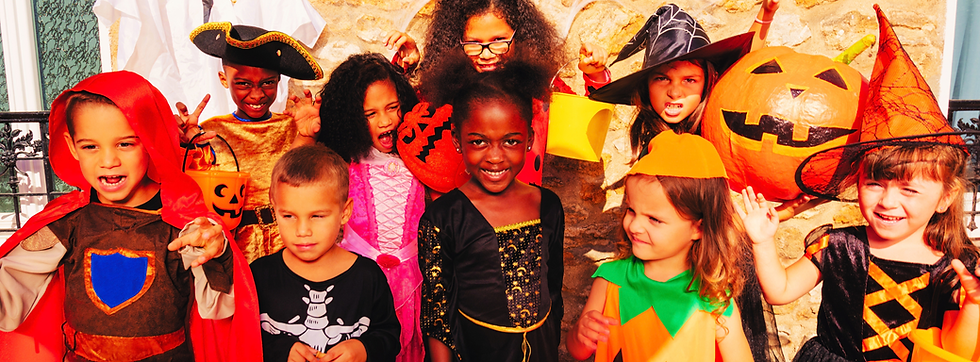Children dressed up in Halloween costumes