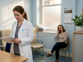 Audiologist prepares otoscope in Edinburgh clinic