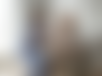 Ear clinic exam between specialist and patient