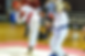 Two women sparring in a competition