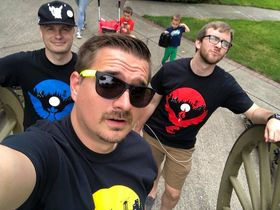 Men with Vancouver Arena logo and team shirts on