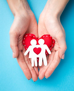 top-view-hands-holding-paper-cut-family-concept_edited.jpg