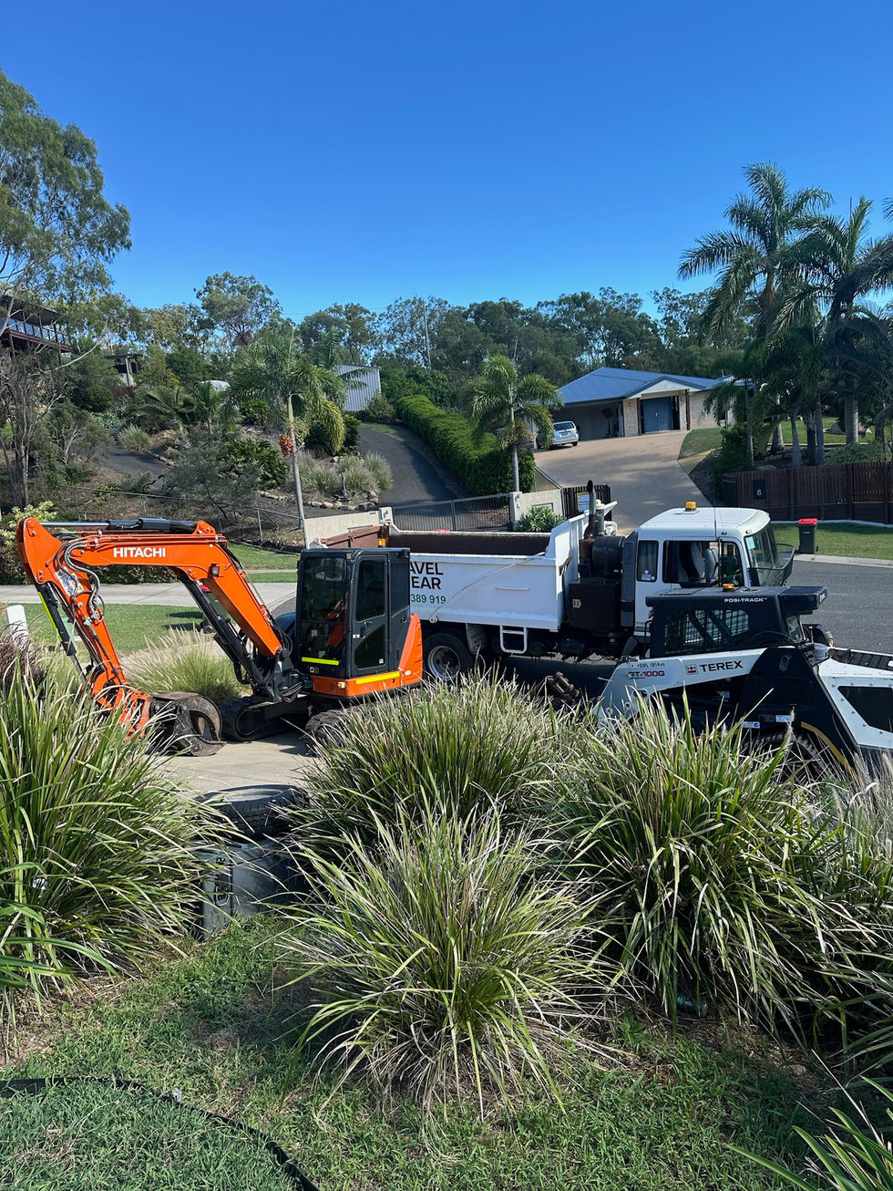 Excavator and truck for garden removal