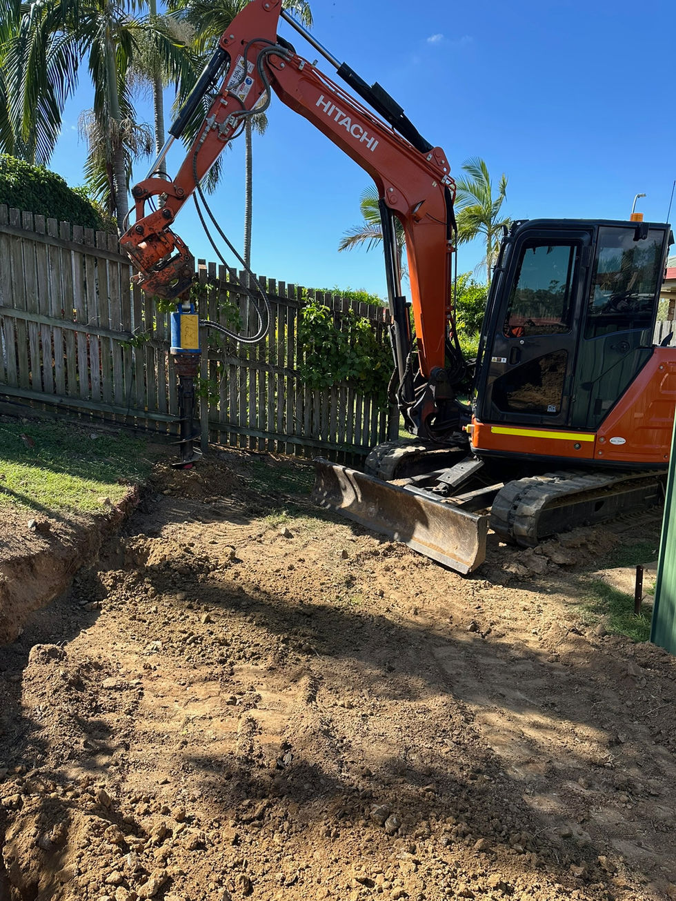 digging trench in a backyard