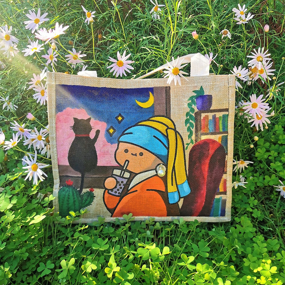 hand painted tote bag in the garden