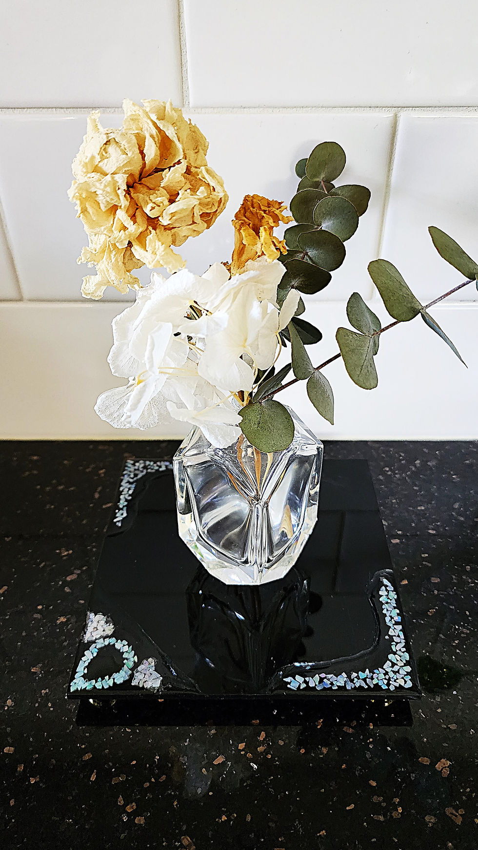 Thumbnail: mother of pearl display stand with flowers