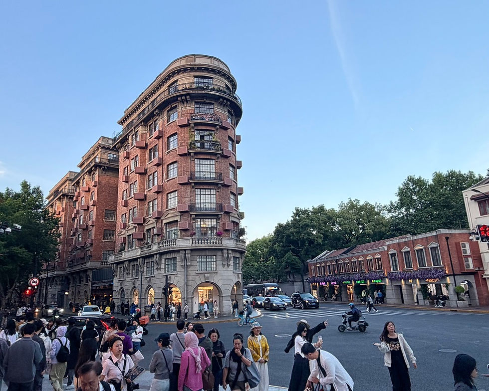April, 2026. The french-style Wukang Building in Shanghai attracts domestic and foreign tourists to take photos. Image: Claire Dong