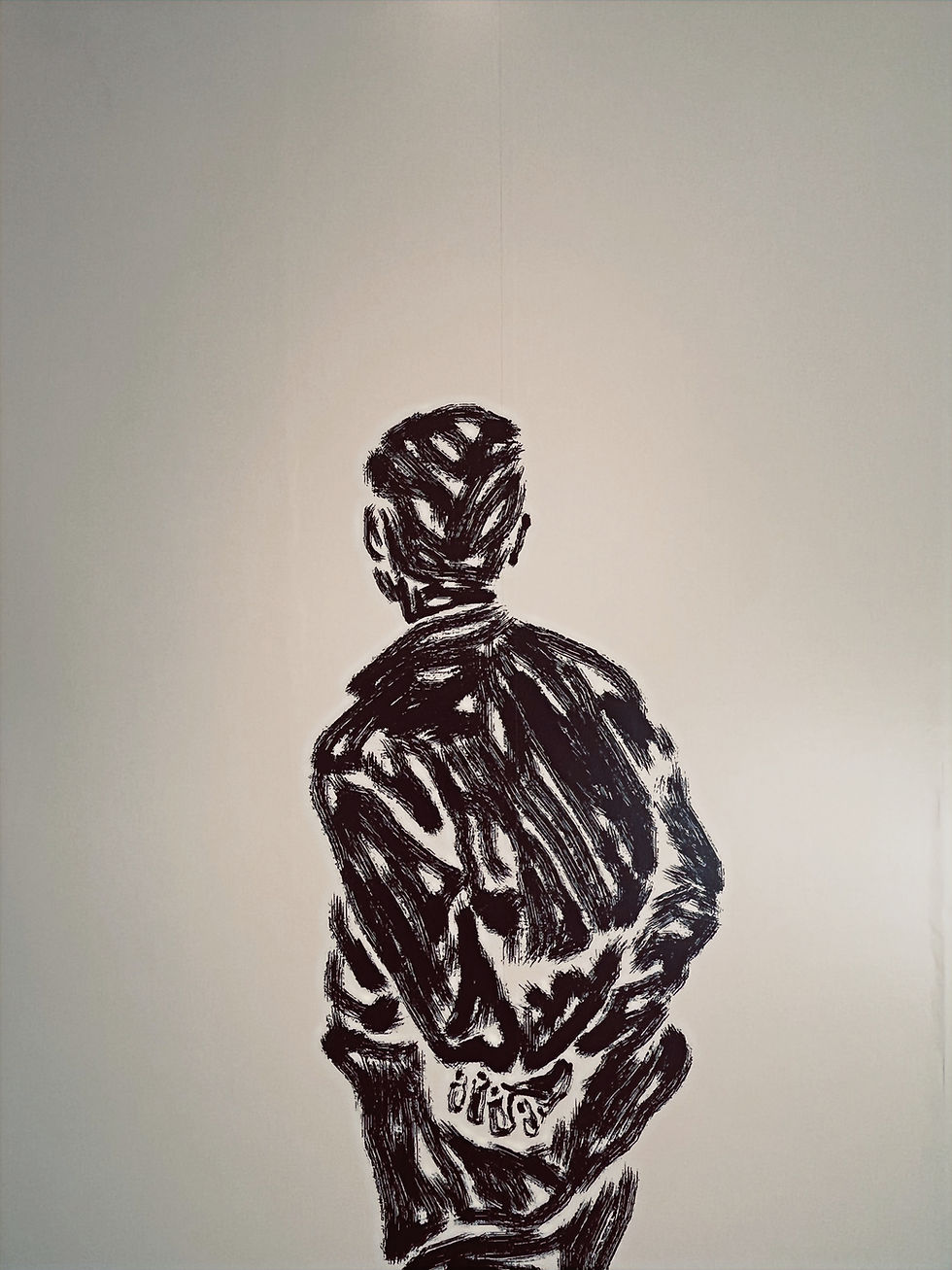 September, 2026. The Fowler Museum of UCLA. A silhouetted figure with hands clasped behind. Image: Frank Fu | R.M.E.